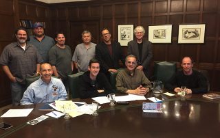 Finally, the cartoonists of the Chicago chapter of the NCS are promoted to a seat at the big table for the Fall 2017 chapter meeting on October 22 - the executive boardroom of the Chicago Tribune in the Tribune Tower in downtown Chicago. Seated in front row (l to r): Brian Diskin, Ryan Pagelow, Richard Pietrzyk, and Pat Byrnes. Standing behind them: Daniel Beyer (2017 chapter inductee), Bill King, Kenny Durkin, Bill Whitehead, Tribune editorial cartoonist Scott Stantis, and Jim McGreal. Invisible member seated in green chair: T. Brian Kelly.